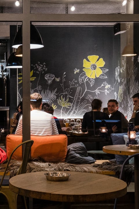 People having beer and conversations at Volta Bräu in Basel