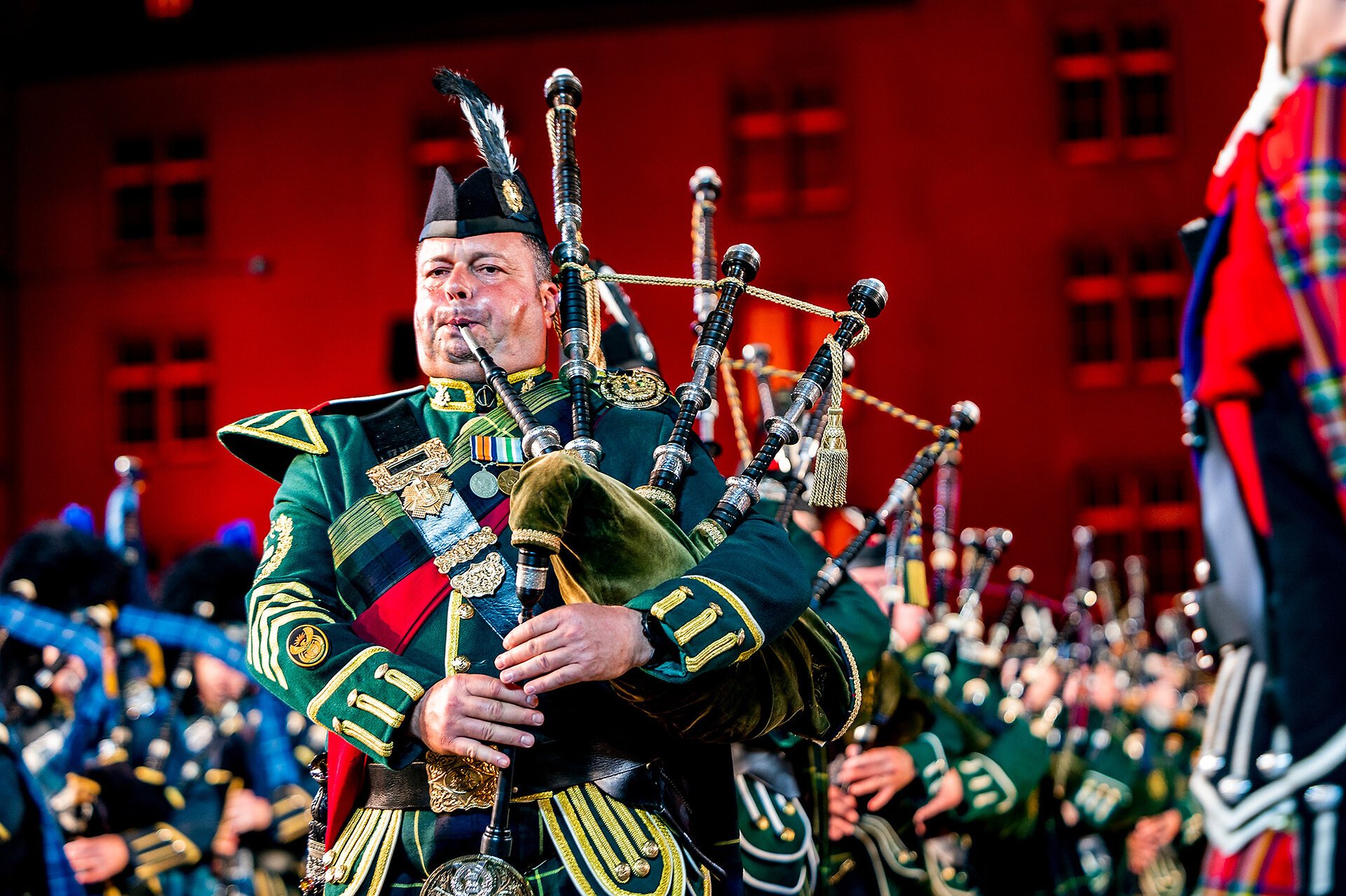 The Massed Pipes and Drums and the Massed Military Bands, International, performs on stage during the dress rehearsal for the Basel Tattoo 2022, Thursday, 14. July 2022, in front of the Barracks in Basel, Switzerland. The Basel Tattoo is a military music festival held from 15 to 24 July 2022 in the city of Basel. (KEYSTONE/BASELTATTOO/Patrick Straub)